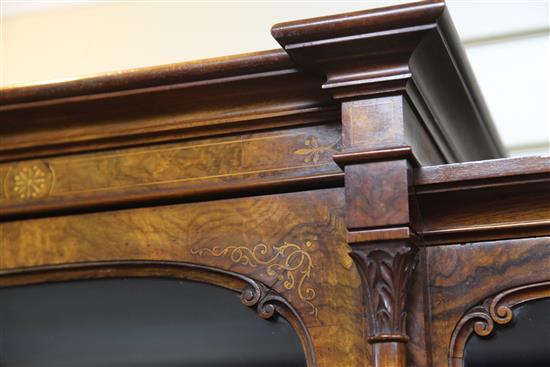 A Victorian burr walnut and marquetry cabinet on bookshelf, by Wilkinson & Son, W.3ft 6in.